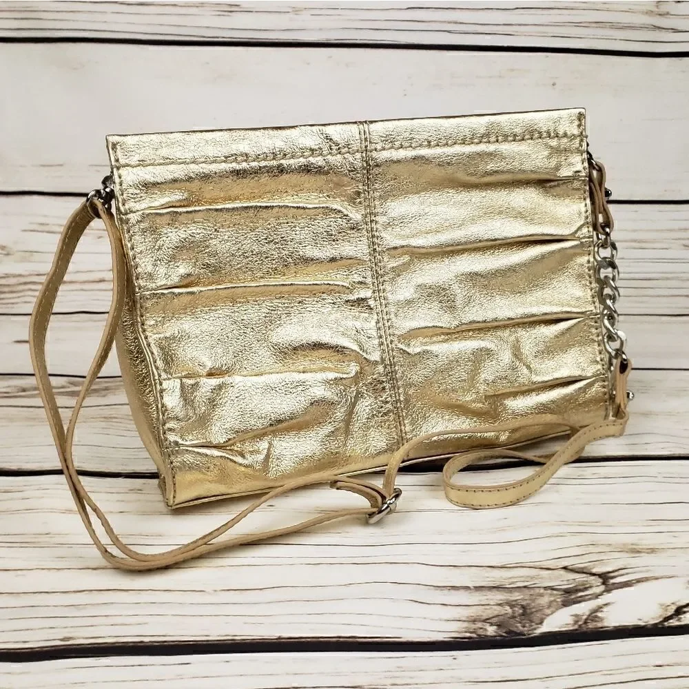 The Sak Charleston Demi Clutch metalic gold purse